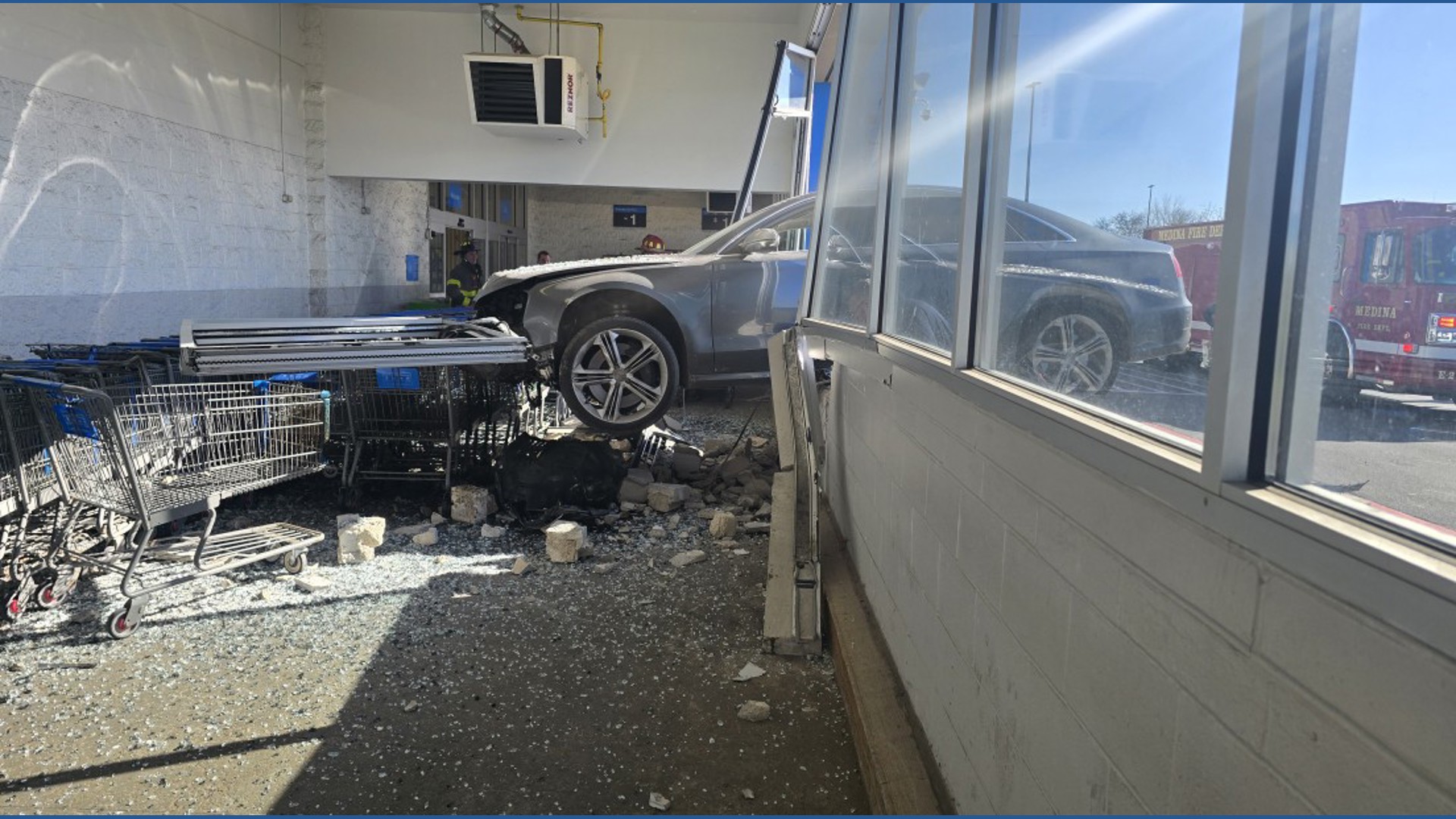 Car goes airborne, crashes into Walmart store in Medina Township: See ...