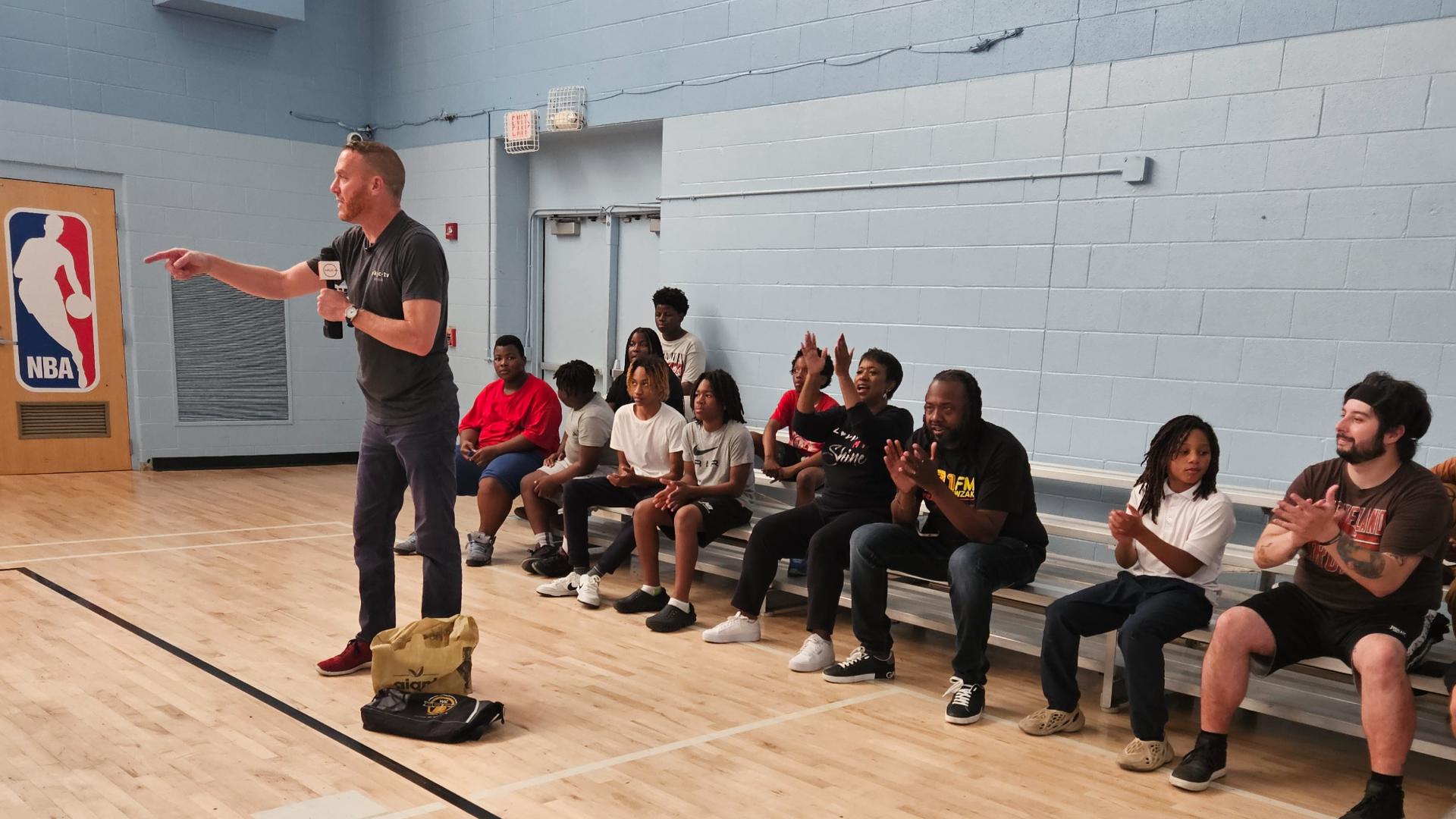 Media "celebs," including Danita Harris, Sam Sylk and the Ultimate Cleveland Sports Show team, joined Polk to shoot hoops with club kids and help raise funds.