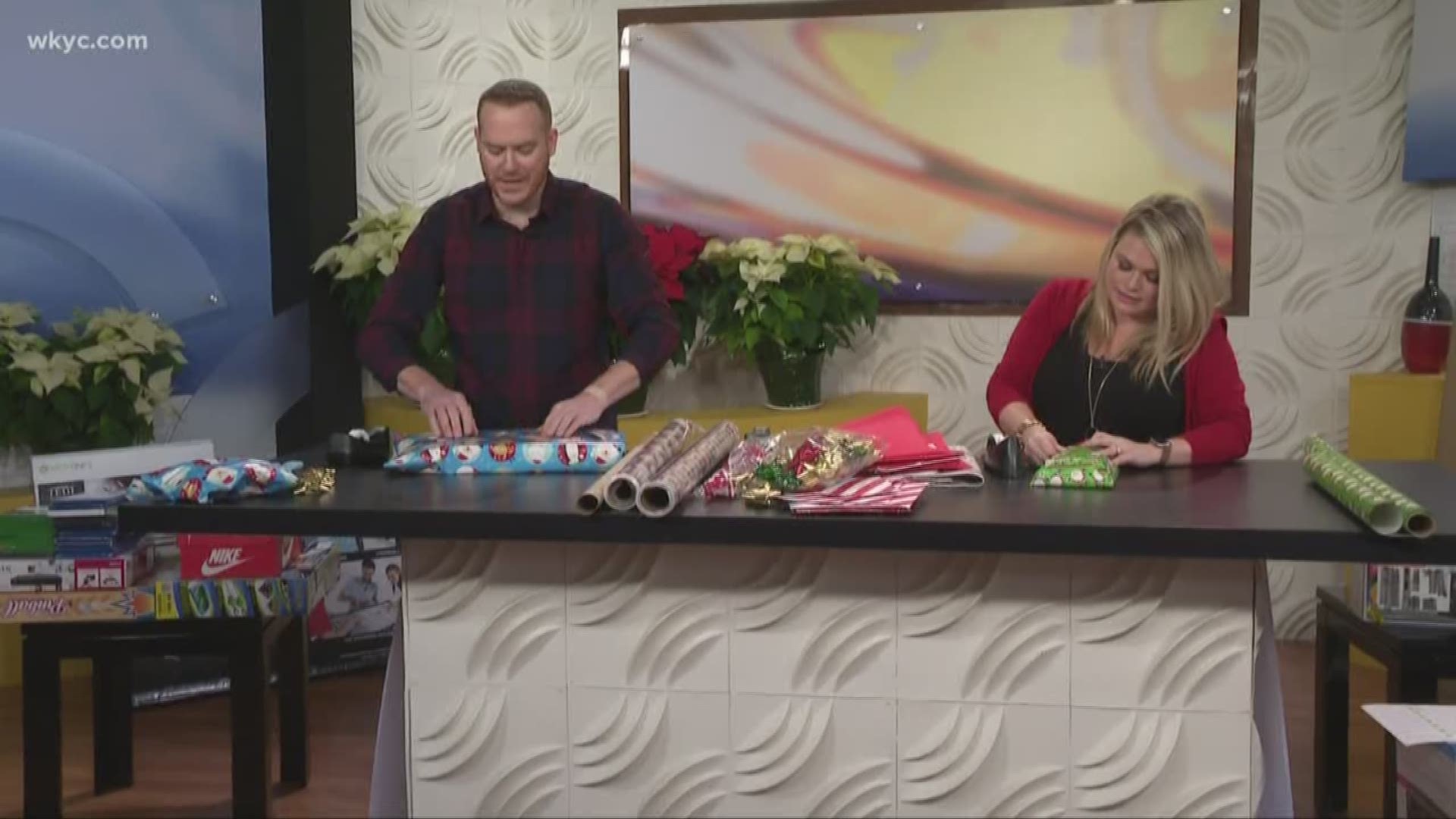 We've teamed up with Fostering Hope to help provide presents for children at the Ohio Guidestone. But first, we had to wrap them! Mike and Lindsay went head-to-head!
