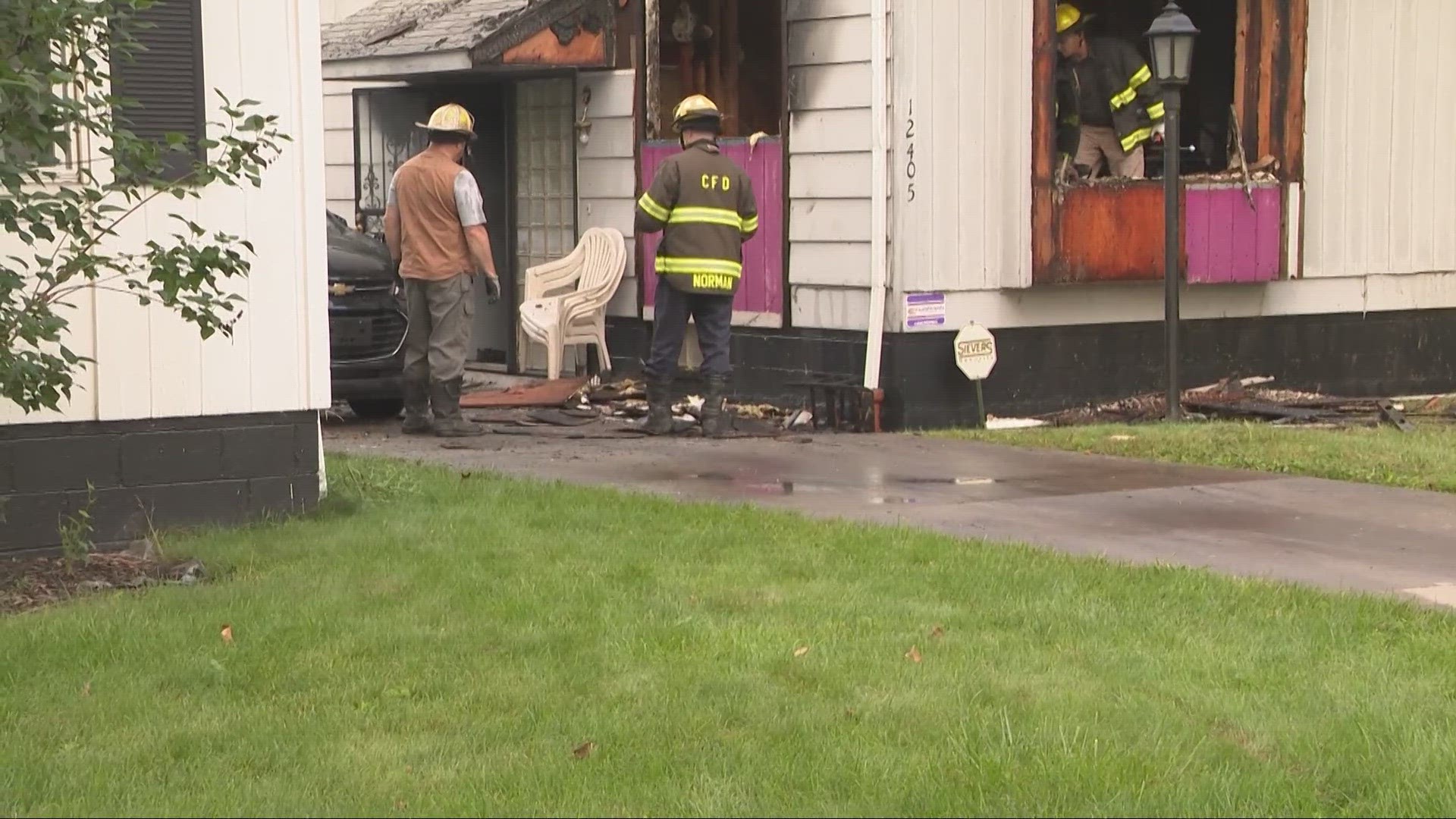 A 60-year-old woman was killed and a 27-year-old man were injured in a house fire in Cleveland on Tuesday morning.