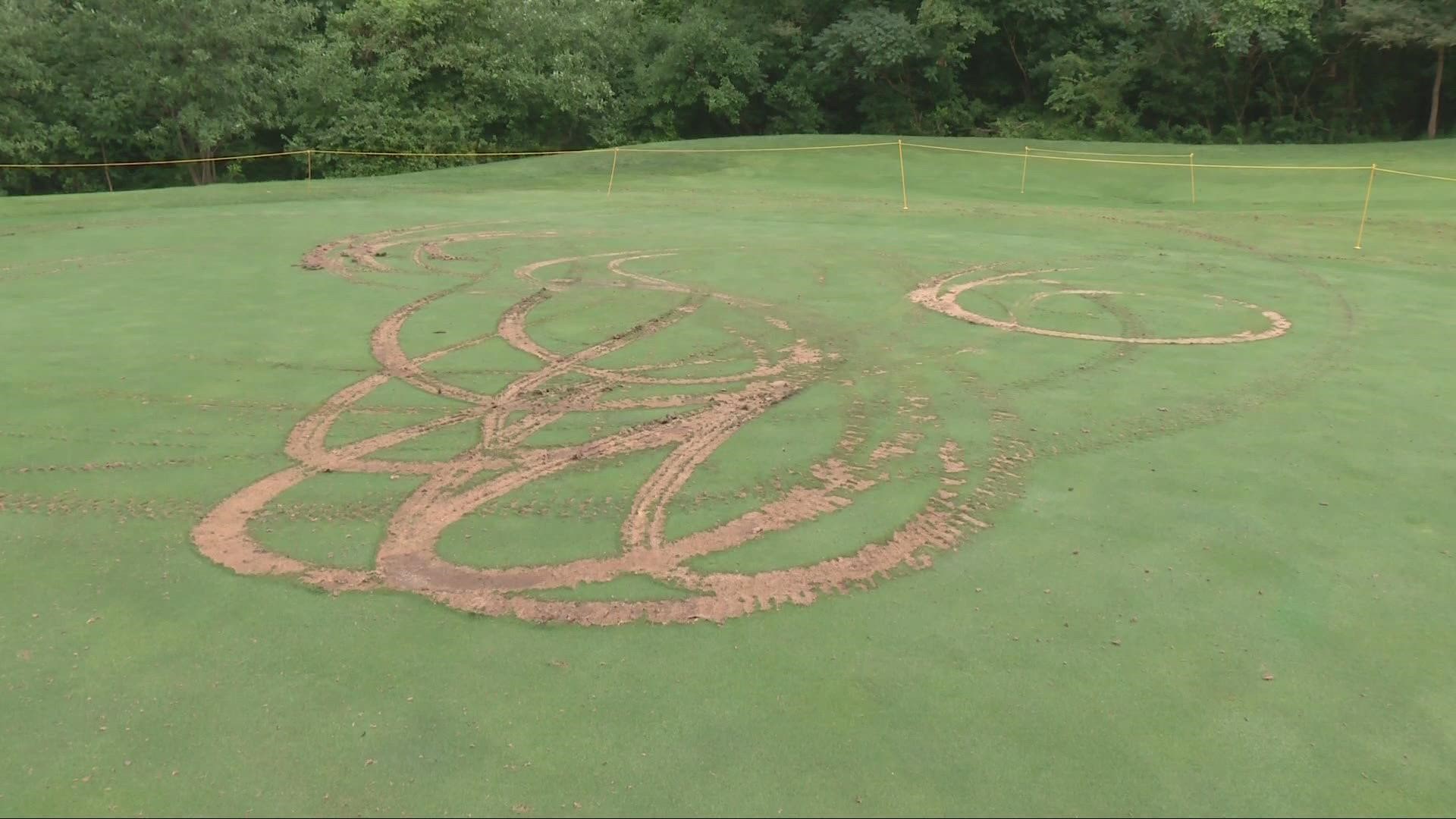 Officials say someone drove a four-wheeler onto the course and did donuts on the green, making the hole unplayable.