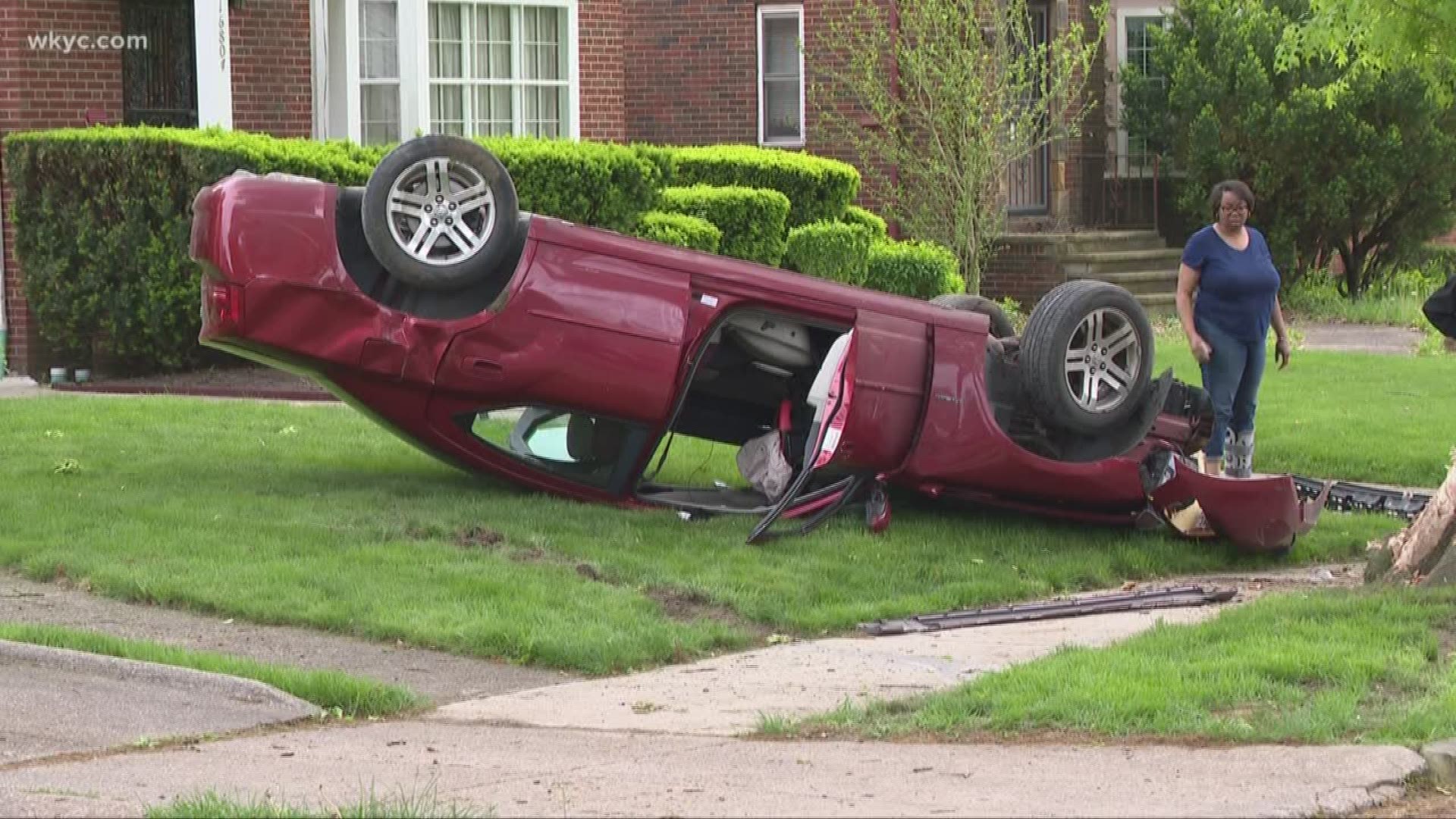 The crash occurred near East 168th St. and Talford Ave. around 4:30 p.m. The car appeared to strike a tree and ended up flipping over onto the grass in a front yard.