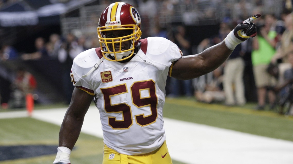 Washington Redskins linebacker London Fletcher (59) argues a