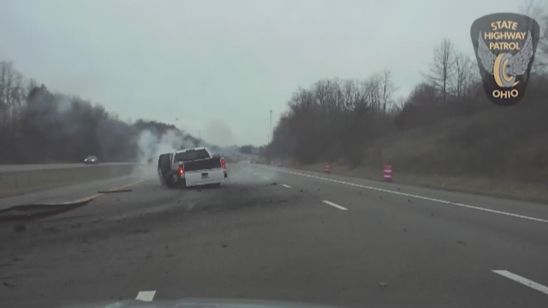 Intense dashcam video shows the moment state troopers pulled a suspect from a burning pickup truck, which crashed during a pursuit in Ashland County.