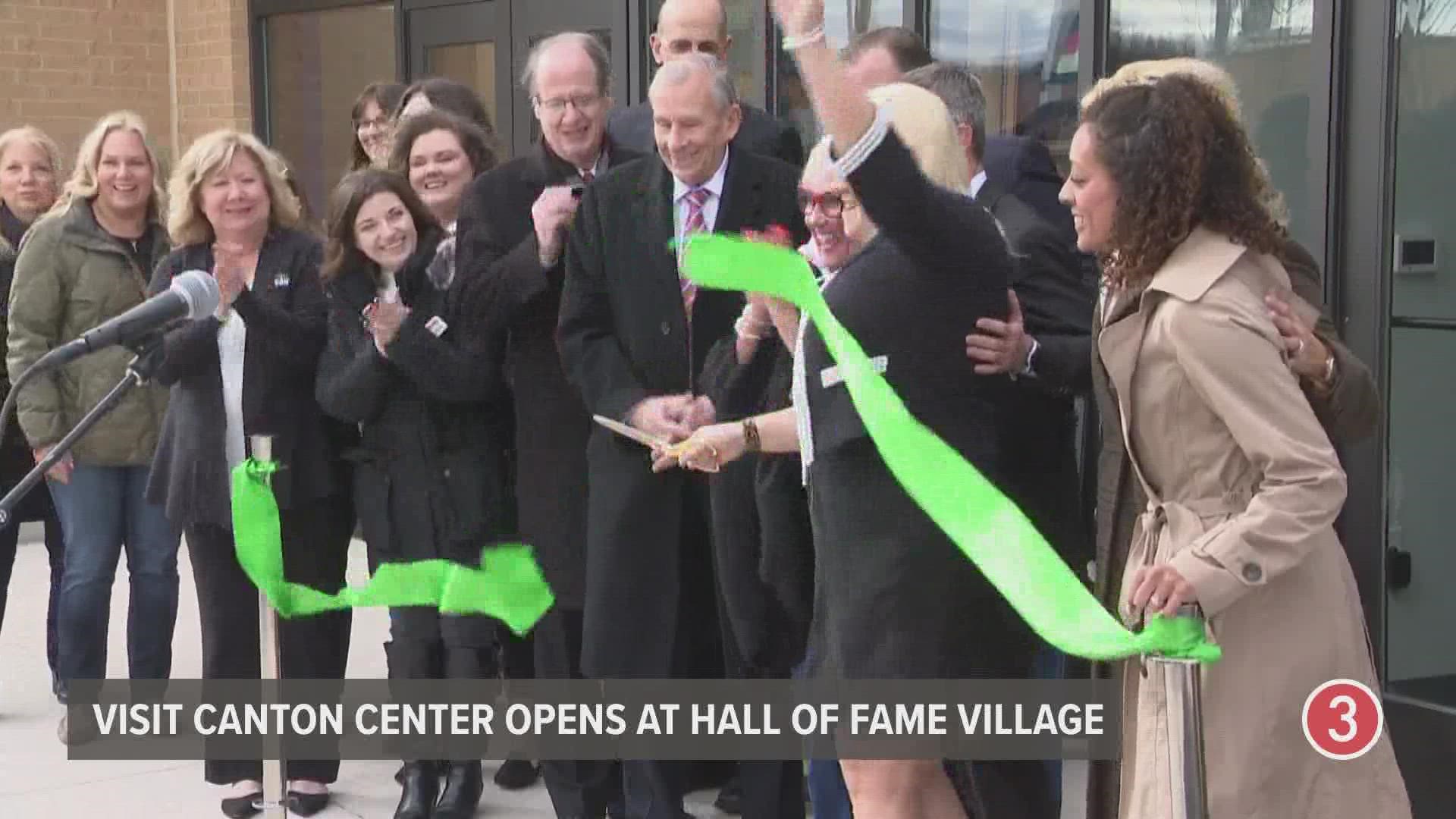 The Visit Canton Welcome Center held a ribbon-cutting ceremony at the Hall of Fame Village on Friday.