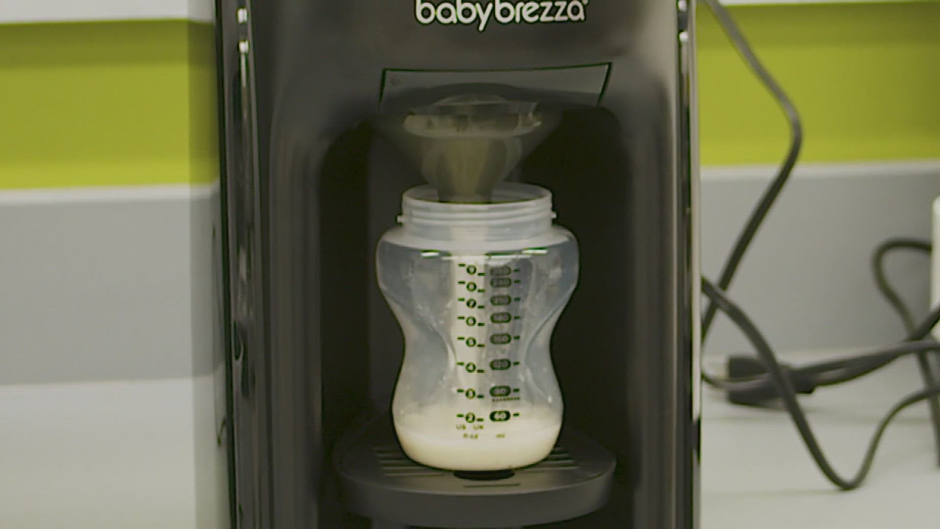 Newer gadgets called infant formula makers claim to make warm, ready-to-drink bottles. But are they worth the money and do they get the job done?