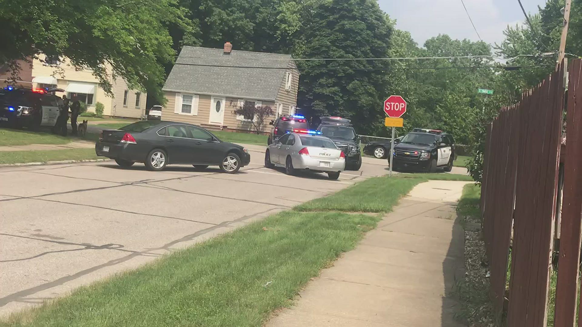 Parma police officers on scene at a stand-off outside of a home in the city. According to officials, the incident took place near Lucerne Avenue and S. Park Blvd.