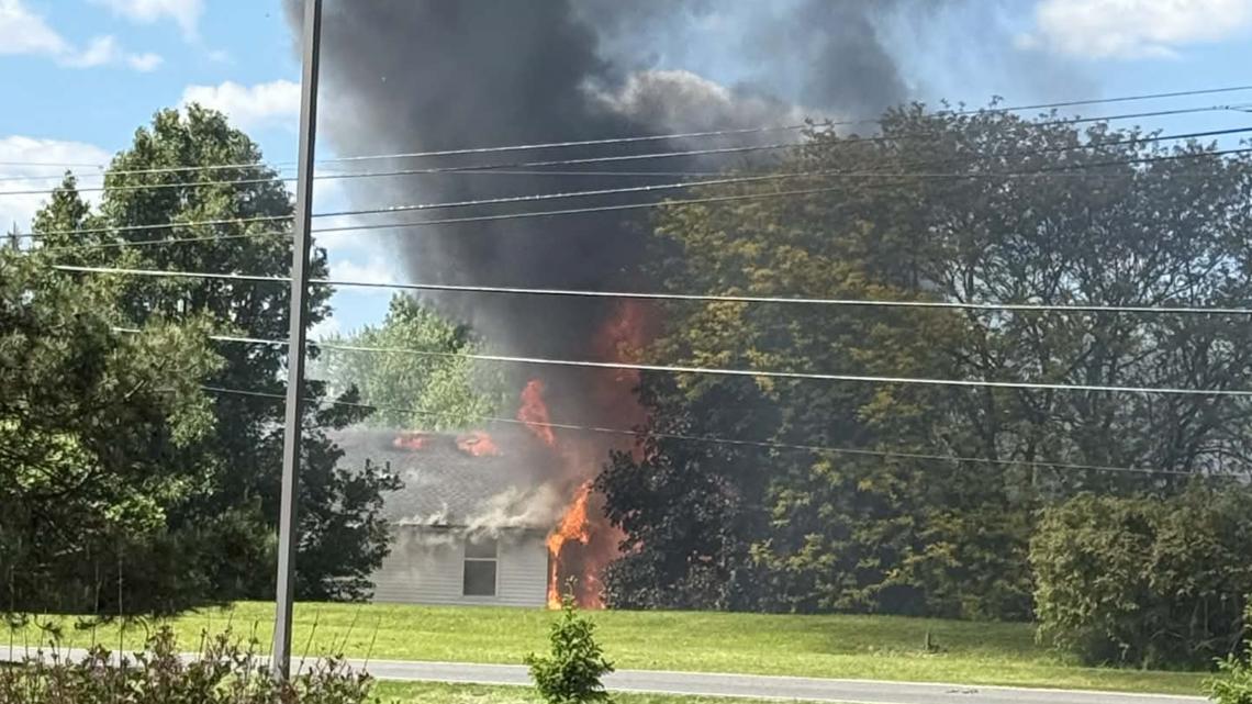 Akron police: 2 dead after plane crashes into home