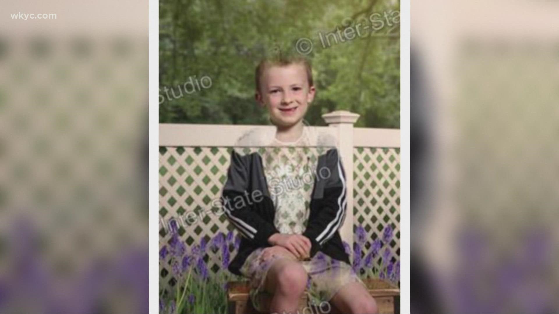 Parents were surprised to see their elementary students 'disappearing' into the background of their school pictures thanks to their St. Patrick's Day green attire.