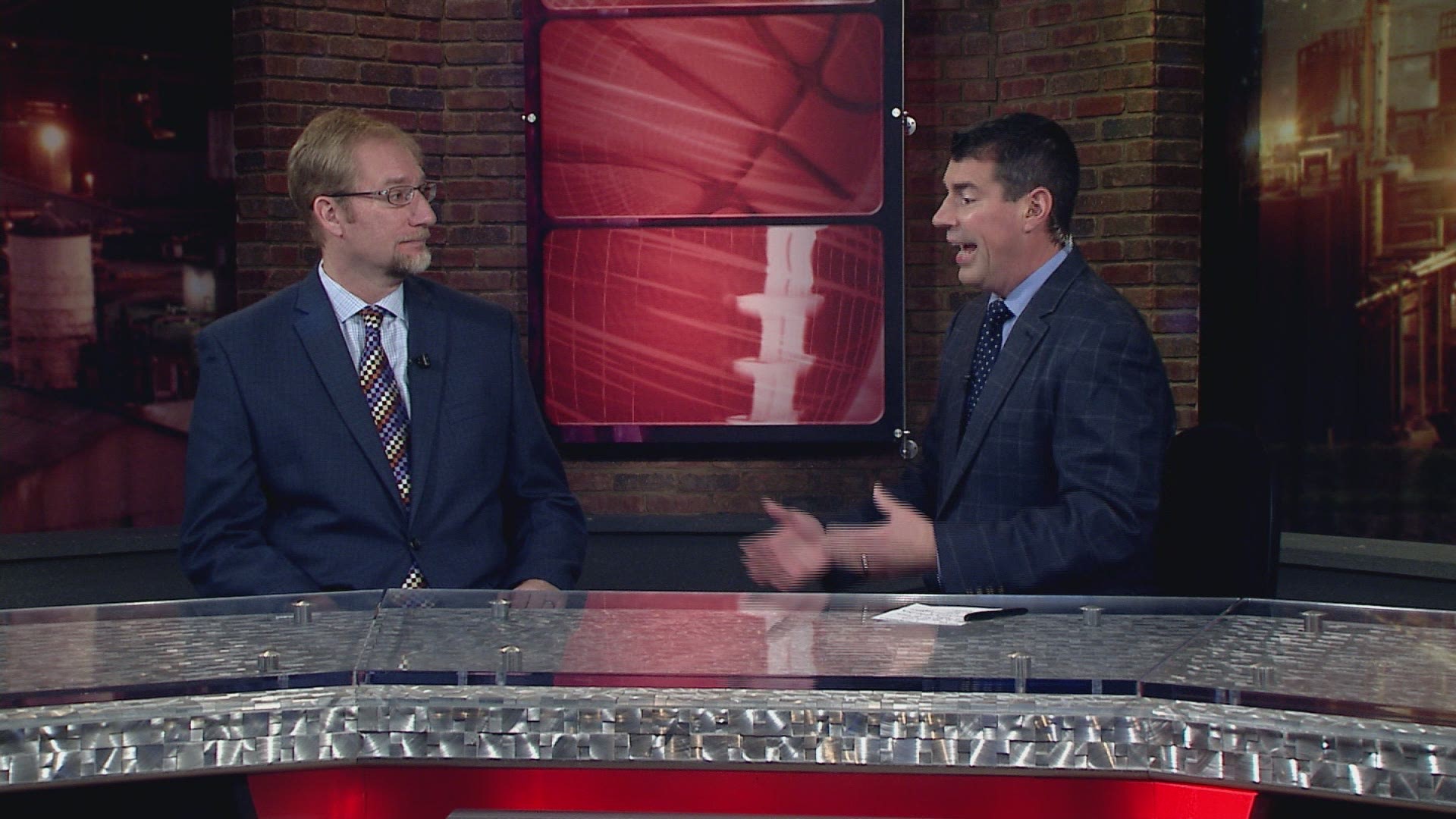 Dave Chudowsky and Scott Petrak react after following the Browns' loss to Houston.