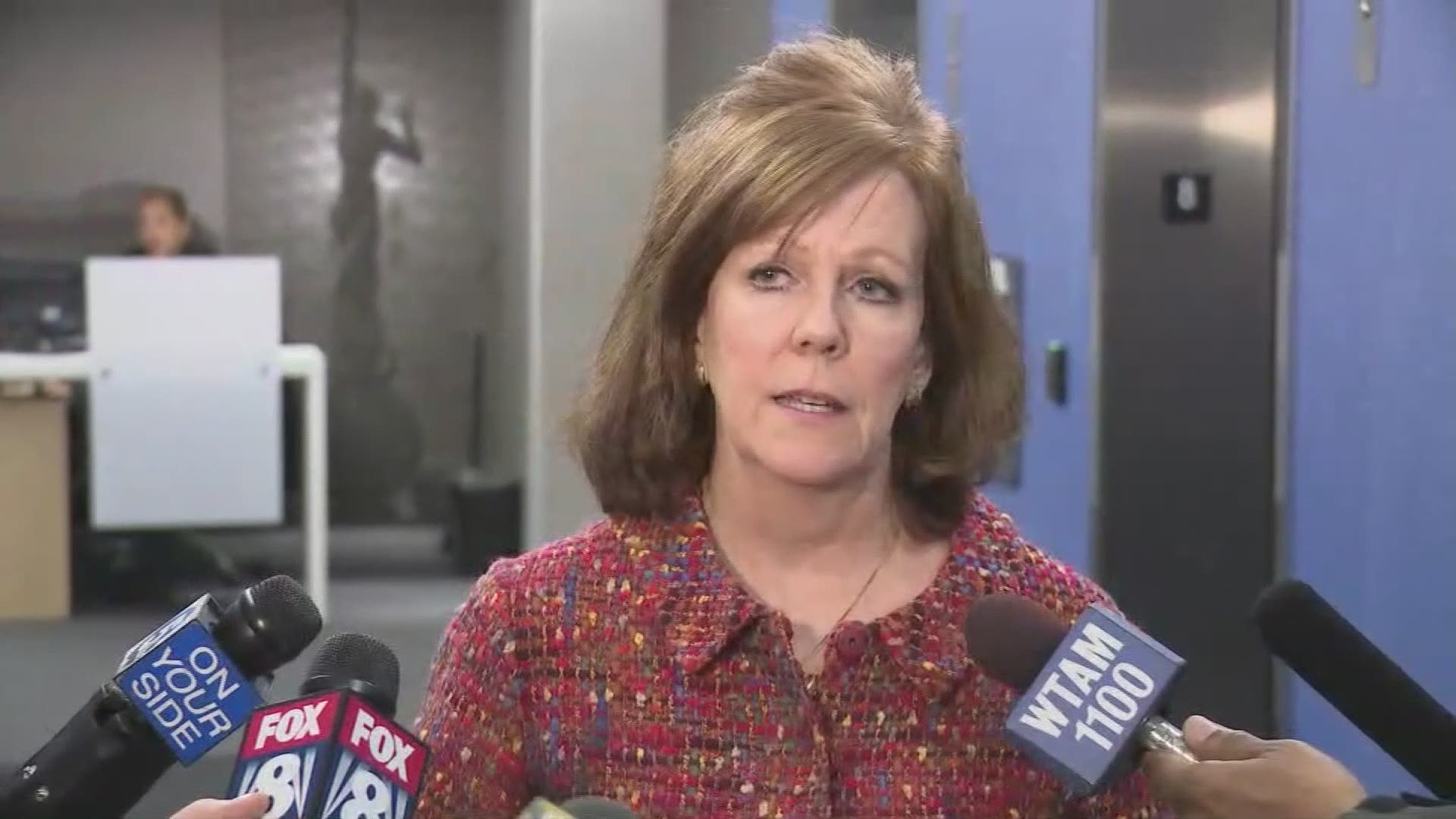 Spokesperson Mary Louise Madigan speaks after authorities searched the offices of Cuyahoga County Executive Armond Budish.