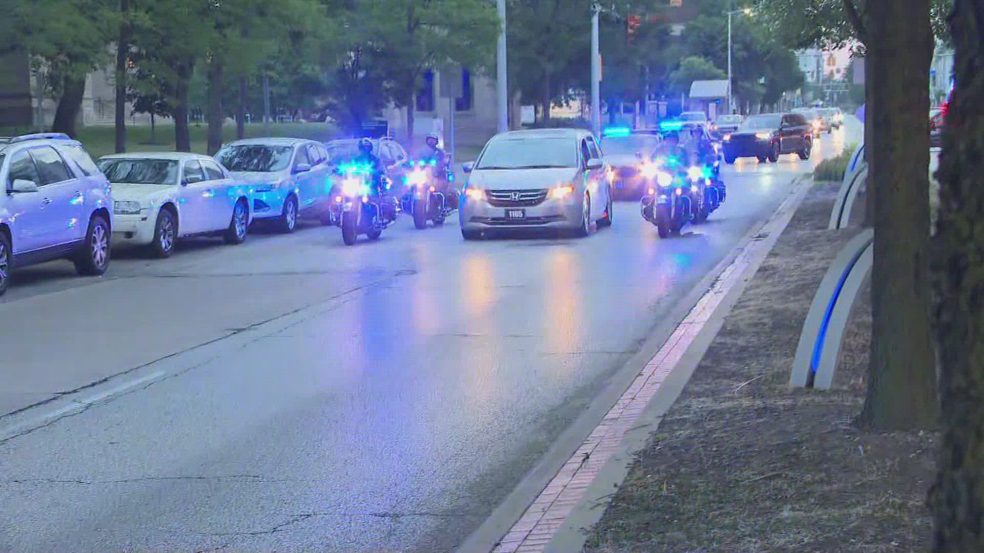 The body of a Cleveland police officer shot and killed in the line of duty was given an escort from the hospital.