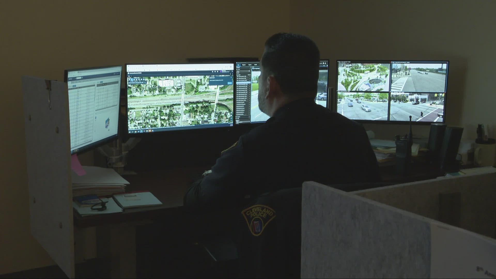 At the Real Time Crime Center, civilians and police utilize different technologies to respond to crimes across Cleveland.