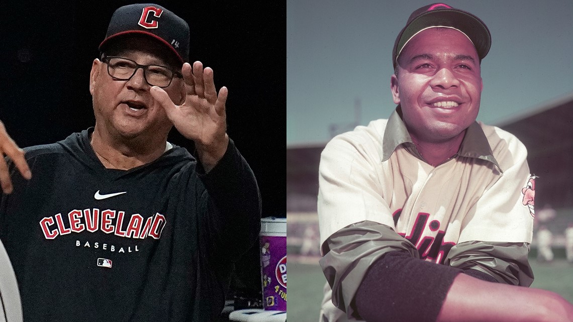 Terry Francona writes Larry Doby's No. 14 on cap to honor
