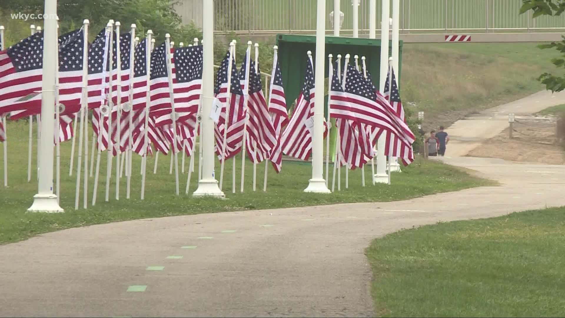 Friday is September 11th and there's an amazing sight at Edgewater Park. Nearly four hundred American Flags went up along the walking path today.