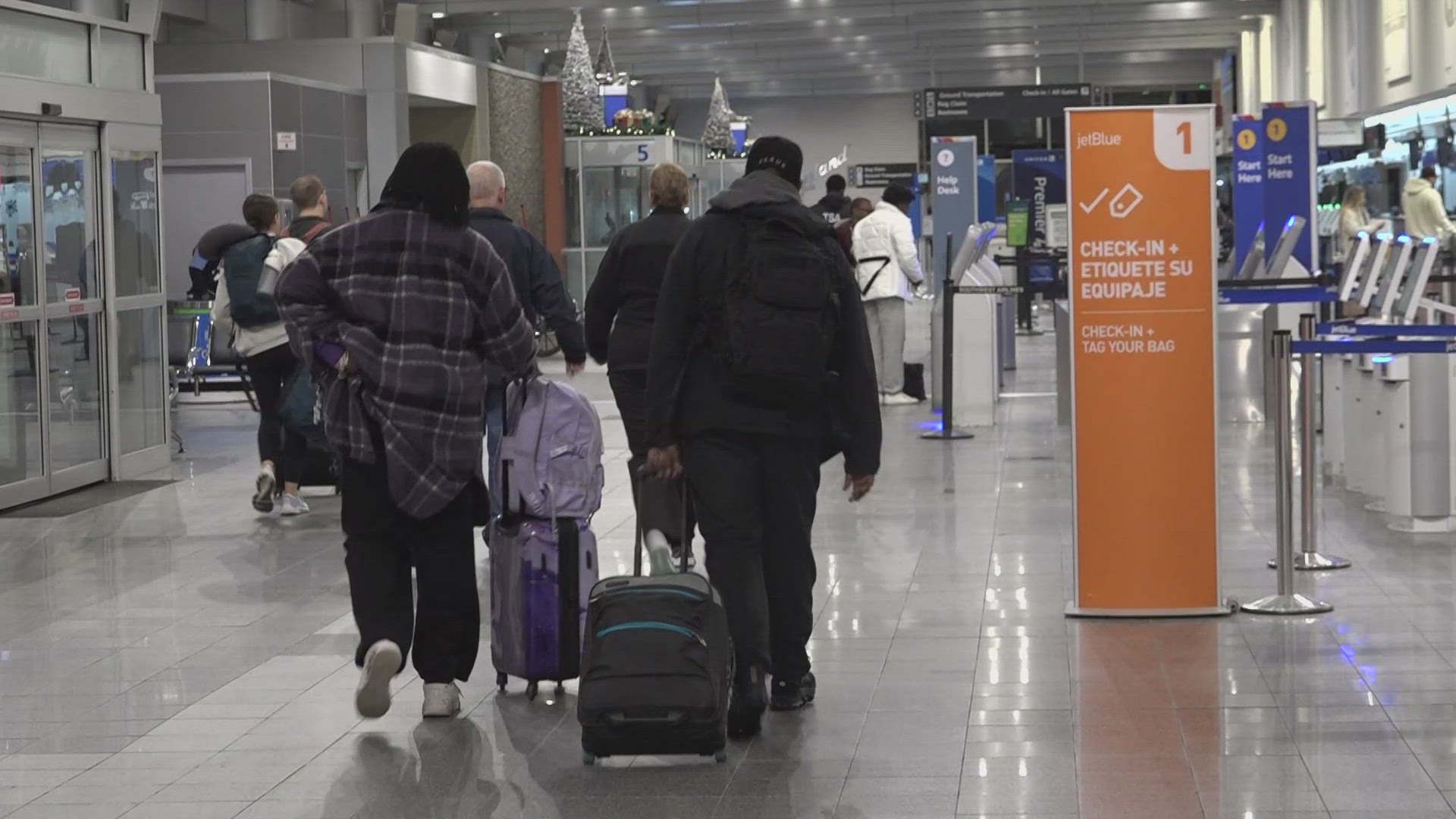 'Airport officials encourage travelers to arrive at least two hours before scheduled departures.'