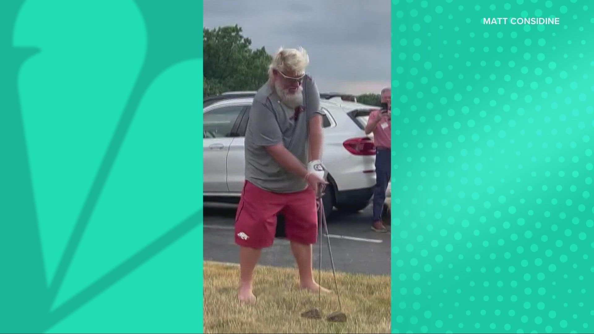 Viral video shows John Daly hitting golf ball across highway and onto Akron  high school football field