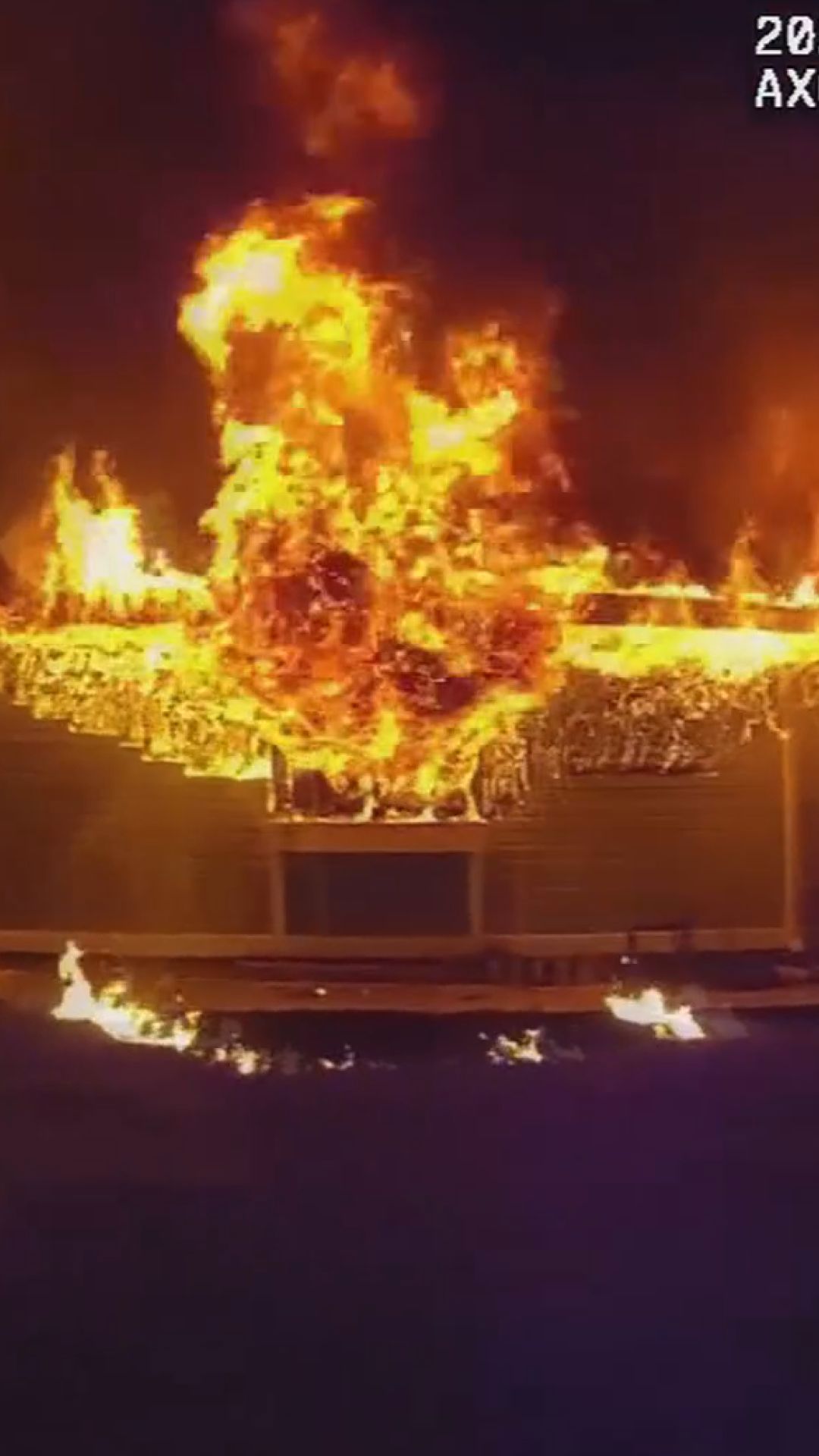 Woman saved from burning home after garage catches on fire in ...