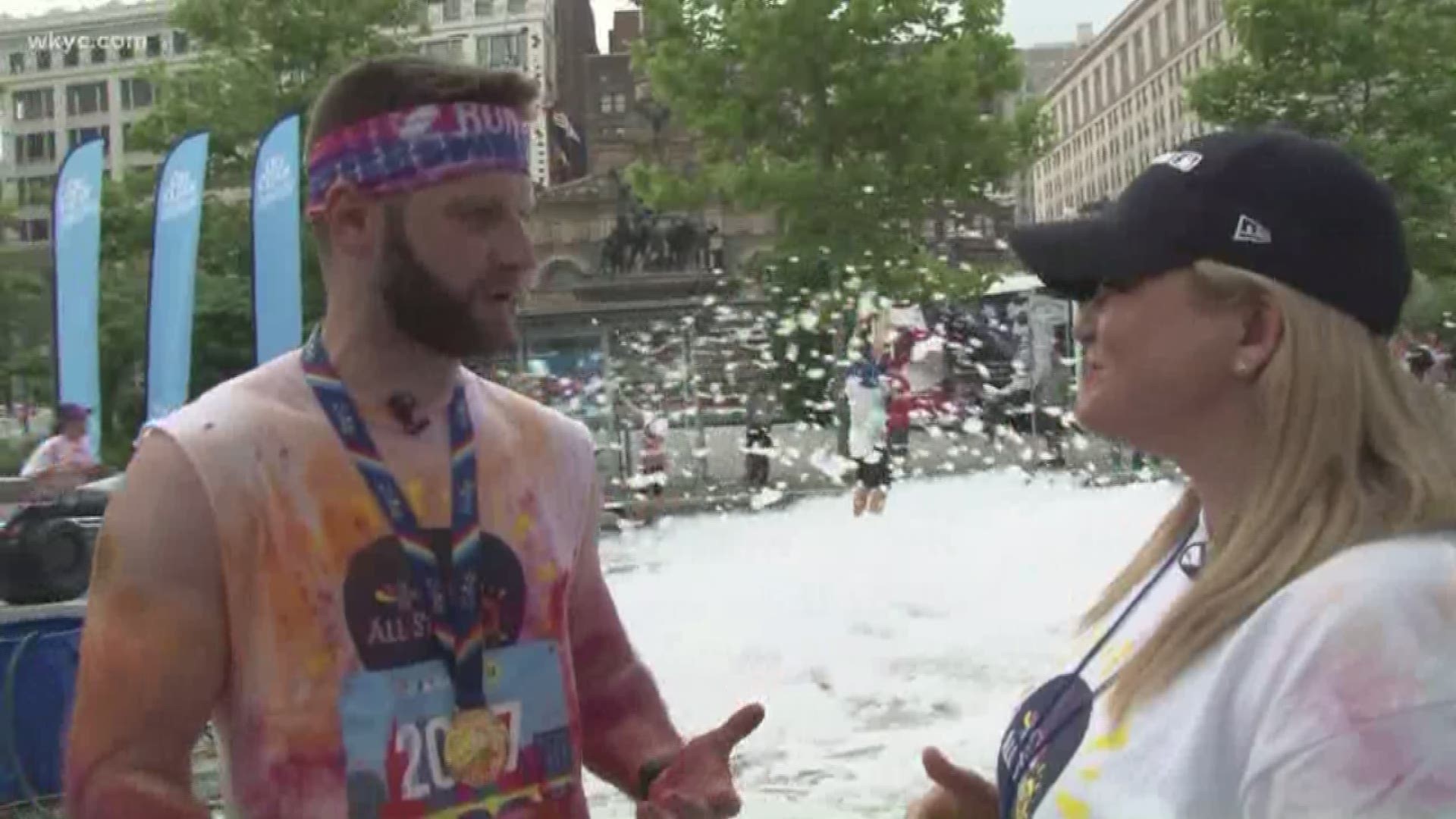 July 7, 2019: In partnership with Major League Baseball in celebration of the upcoming All-Star Game in Cleveland, The Color Run hosted a 5K event downtown early Sunday morning, just one of various global cities it will visit throughout the year. Runners were given a special MLB shirt and doused with numerous colored powders along the race route.