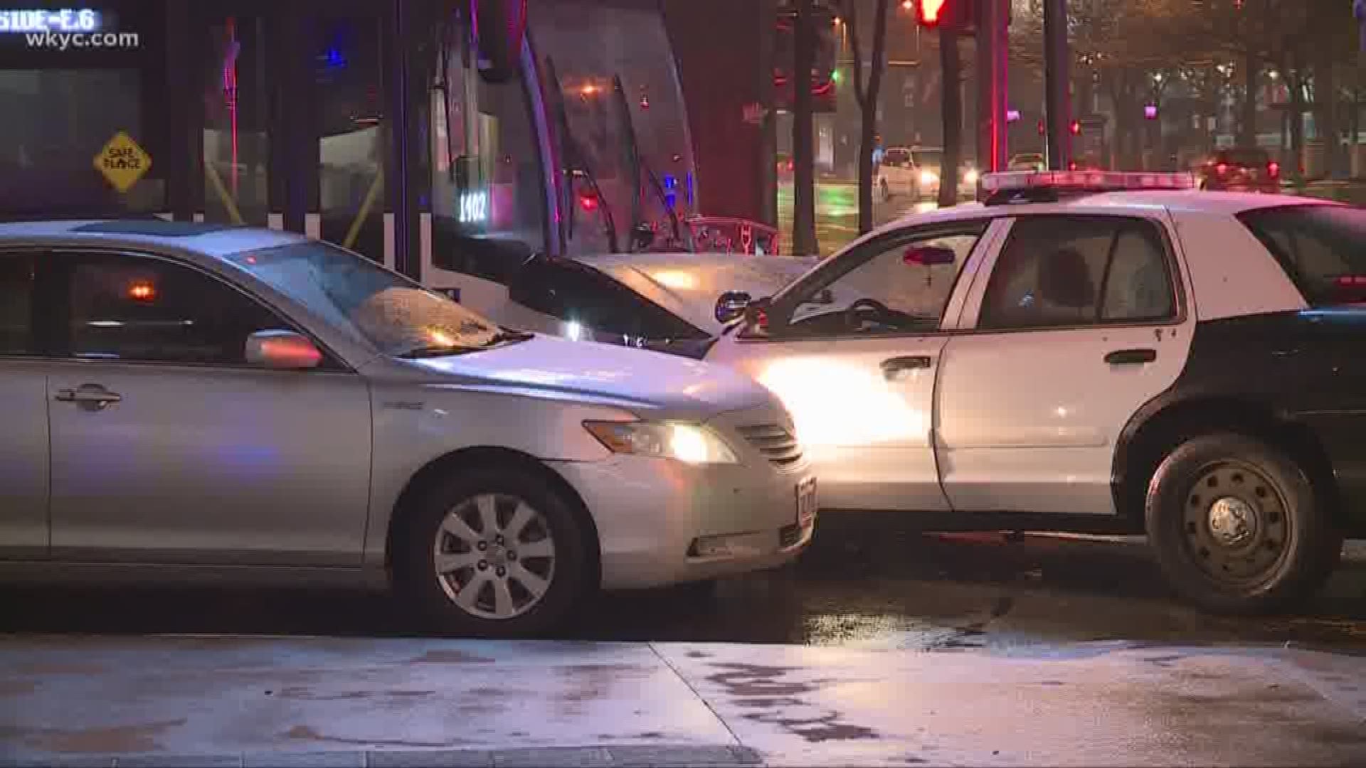 Police cruiser crashes into RTA bus, multiple cars and injures pedestrian in downtown Cleveland