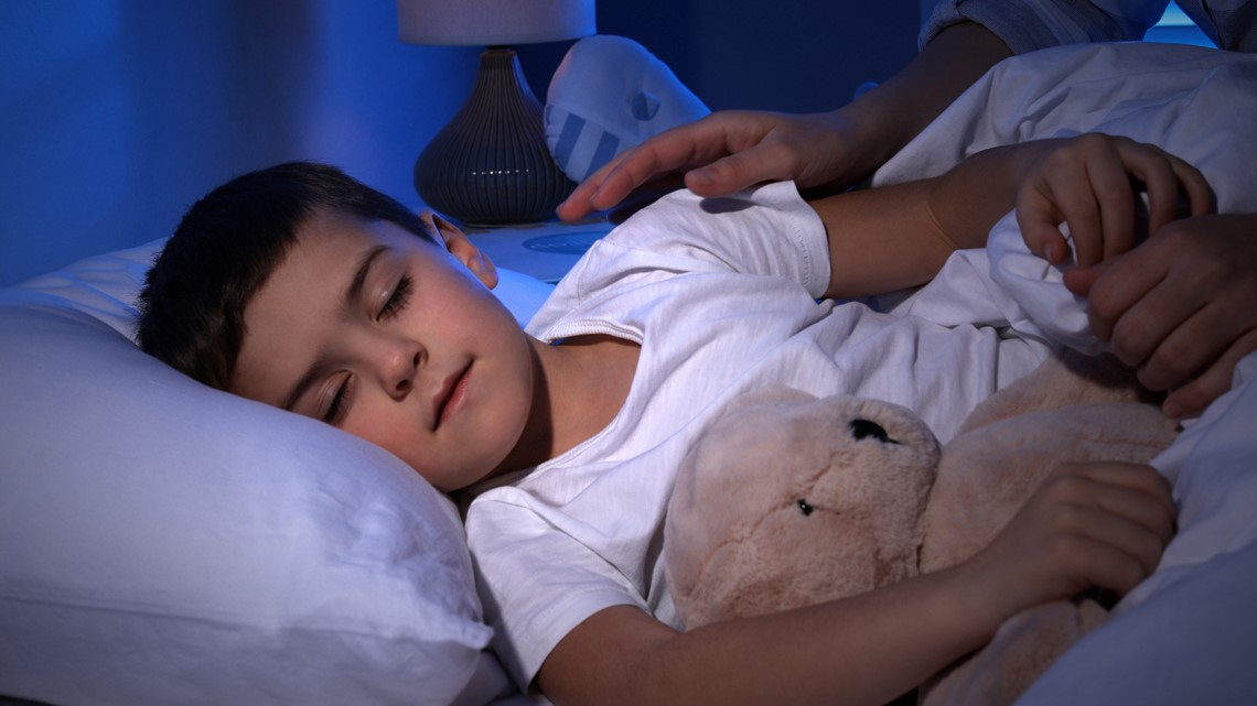 How old is too old to let your child sleep in bed with you? Mom Squad expert advice