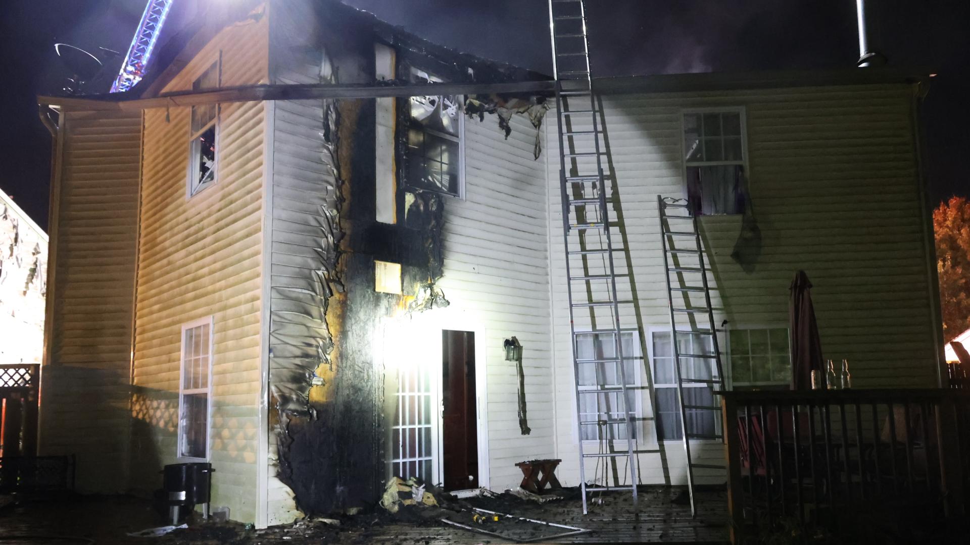 Indy firefighters hospitalized after floor collapses in home fire ...