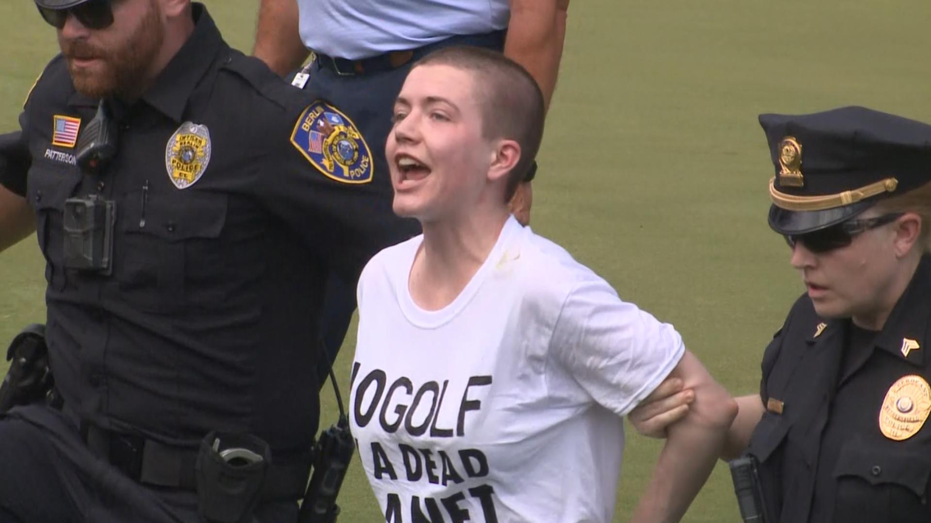 As Scottie Scheffler and Tom Kim battled on Hole 18 at the final round of the 2024 Travelers Championship, multiple protestors forced their way onto the green.