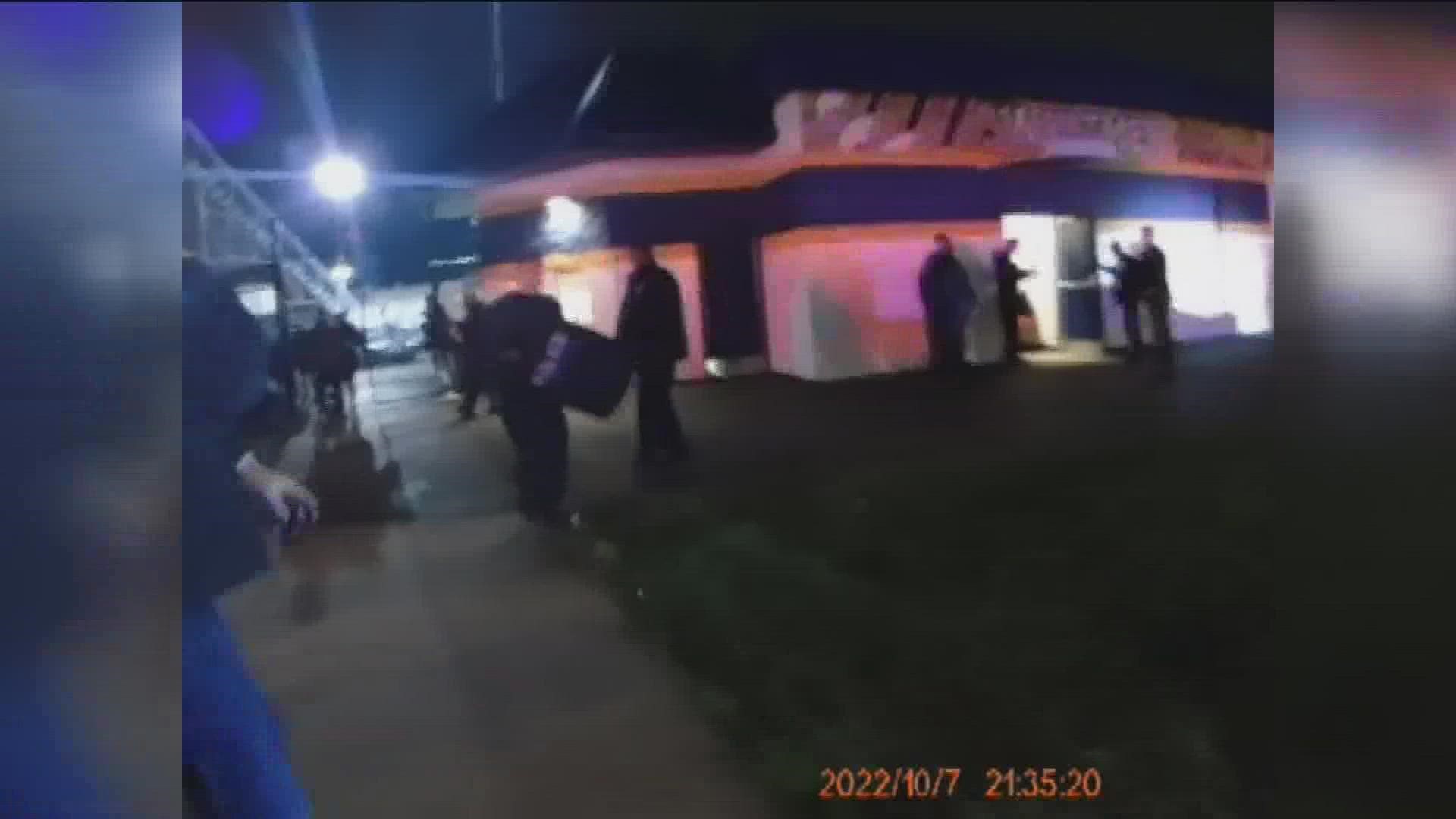 Authorities have released recordings from the night three people were shot outside the Whitmer High School football game.