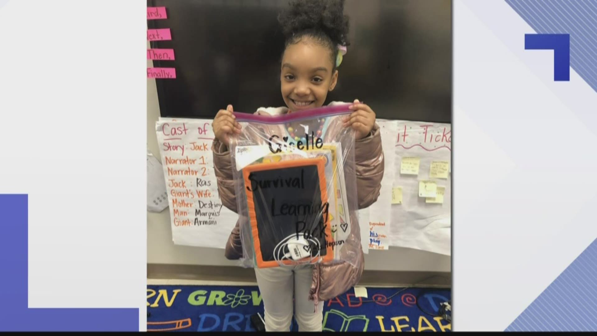 A principal snapped a photo of one of her studetns with her learning pack.
