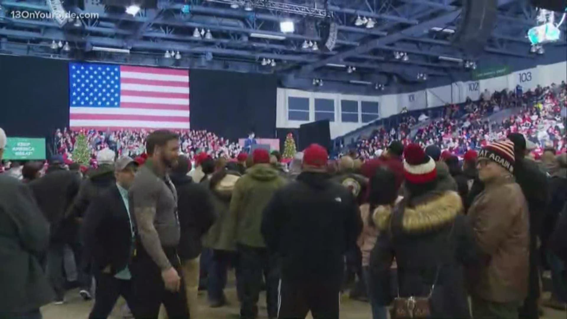 Crowds are anxiously awaiting President Donald Trump's arrival in Battle Creek for his Merry Christmas rally.